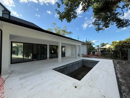 a view of a house with entertaining space