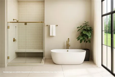 a white bath tub sitting next to a white sink