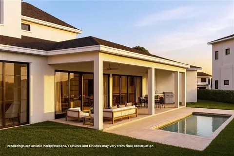 a view of a house with backyard porch and wooden floor
