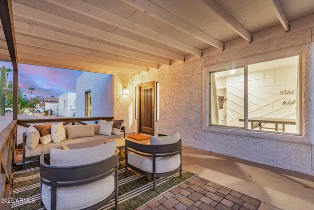 a view of a house with a snow in the yard