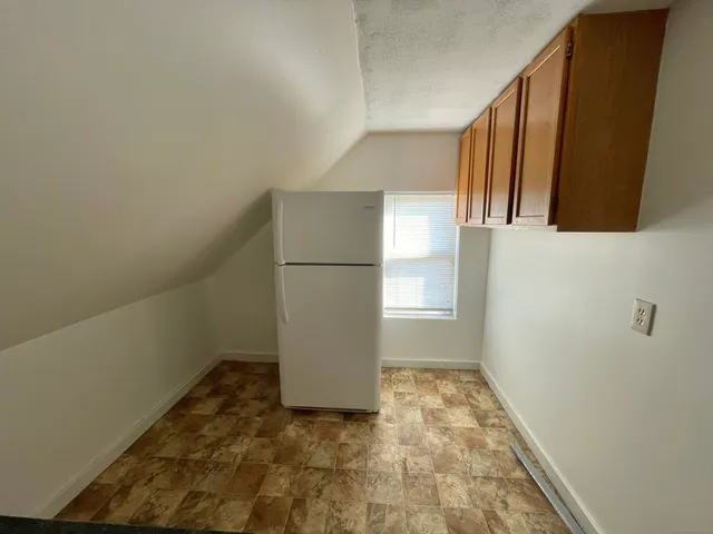 a view of a house with wooden stairs