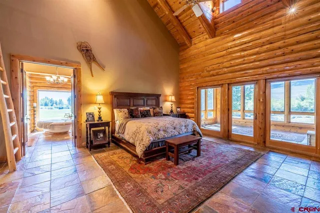 a view of a patio with wooden floor