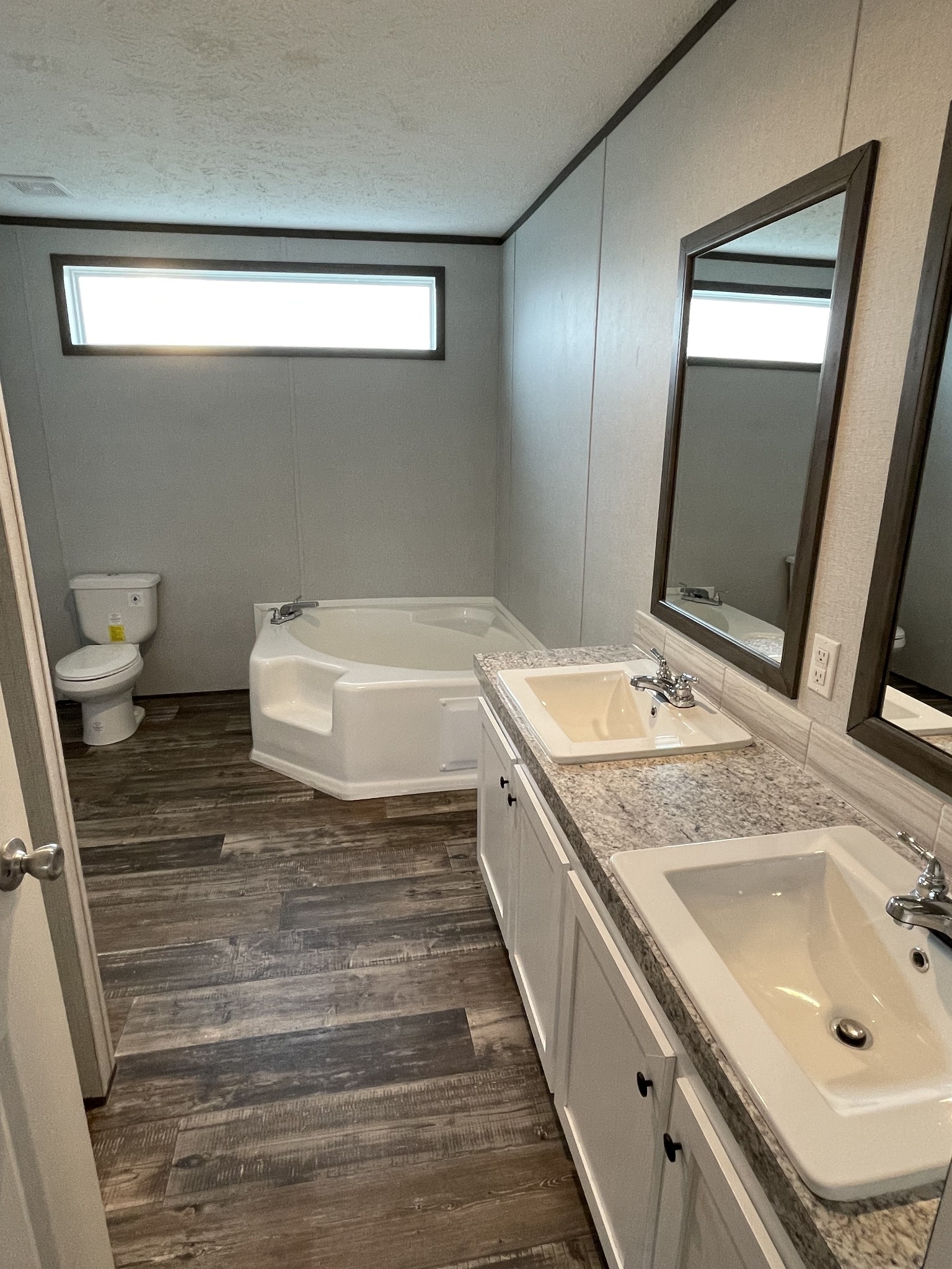 826 Pointe Lane Lafayette, TN 37083 - Photo 14 of 21 a bathroom with a sink a toilet and mirror