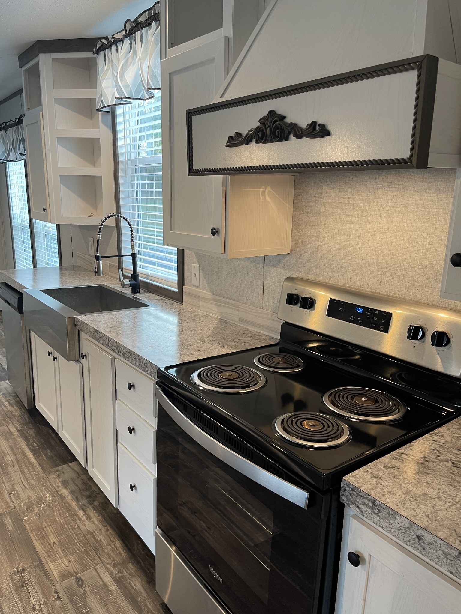 826 Pointe Lane Lafayette, TN 37083 - Photo 2 of 21 a kitchen with a stove and a sink