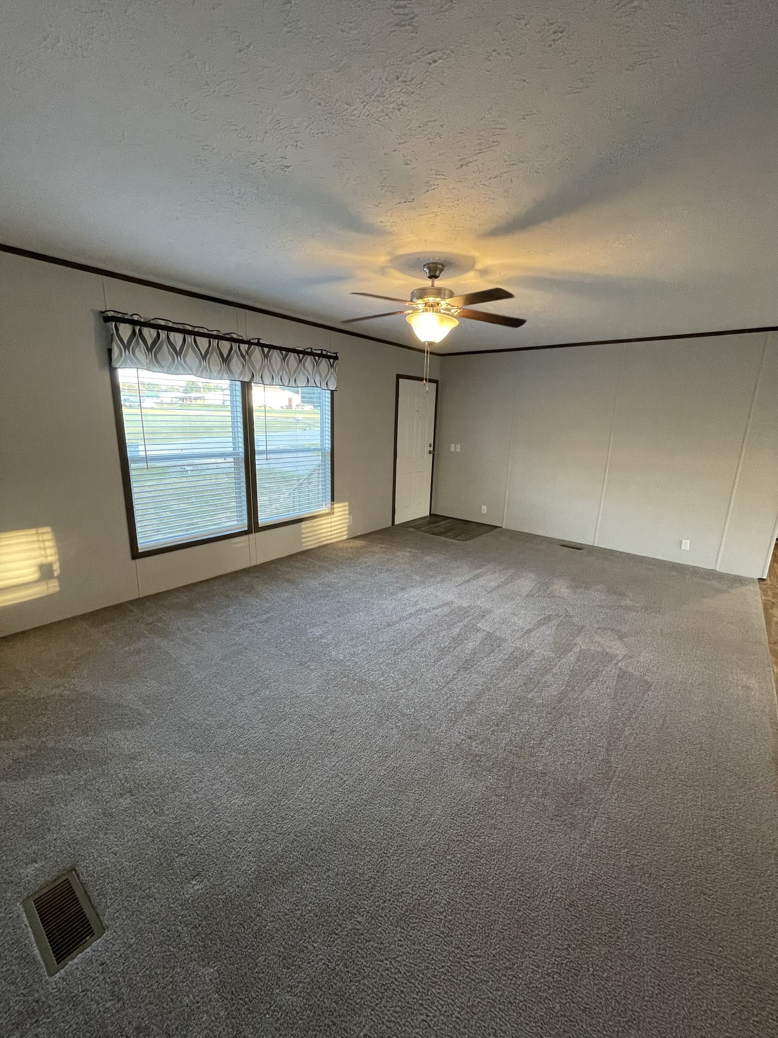 826 Pointe Lane Lafayette, TN 37083 - Photo 9 of 21 a view of an empty room with a window