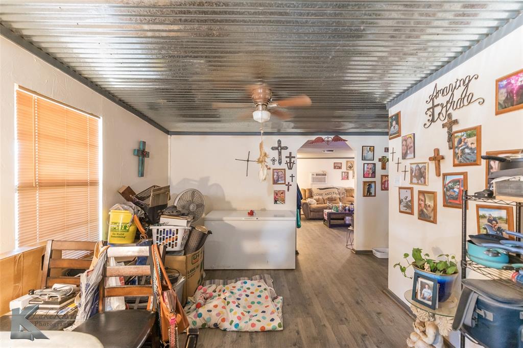 576 McCartney Lane Tye, TX 79563 - Photo 11 of 38 a living room with furniture and a wooden floor