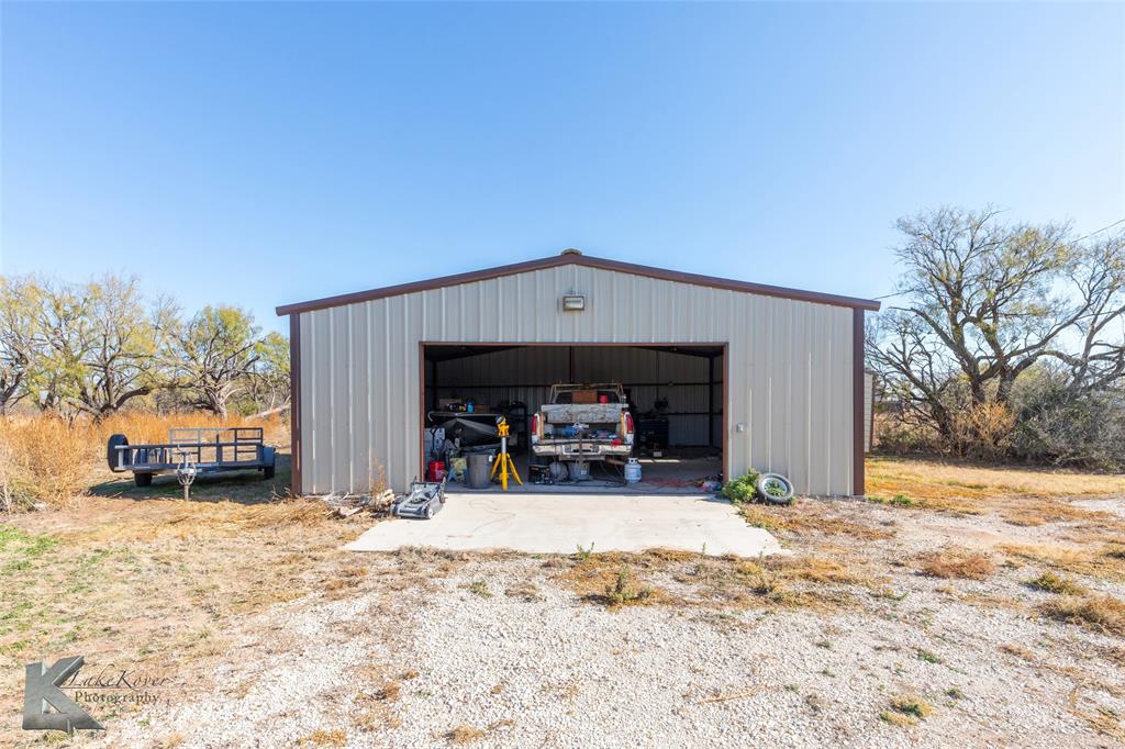 576 McCartney Lane Tye, TX 79563 - Photo 24 of 38 a view of a house with snow in front of it