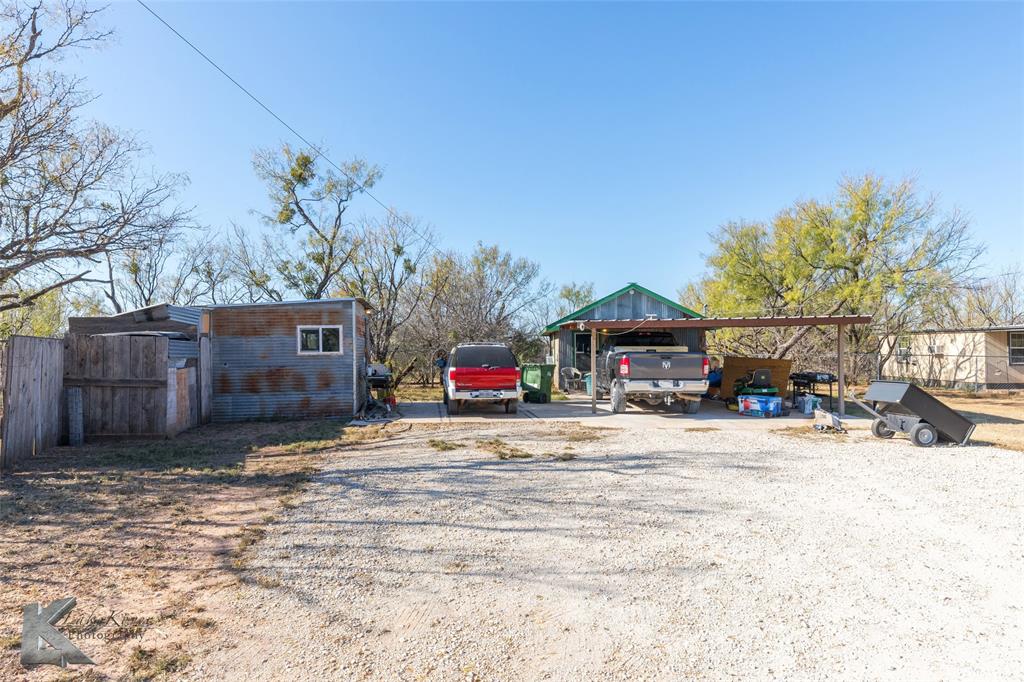 576 McCartney Lane Tye, TX 79563 - Photo 27 of 38 a view of a house with a snow in the yard