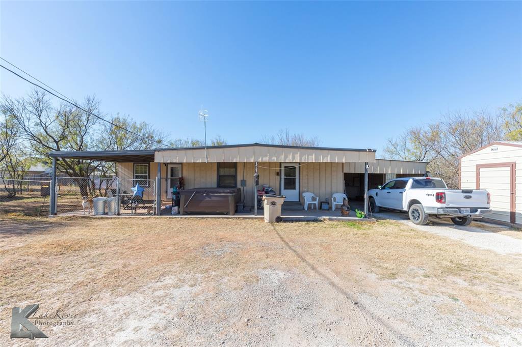 576 McCartney Lane Tye, TX 79563 - Photo 5 of 38 a view of a house with outdoor space and a sitting area