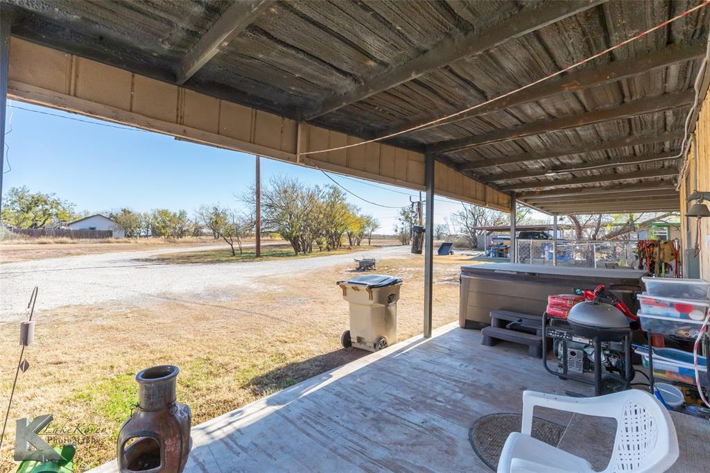 576 McCartney Lane Tye, TX 79563 - Photo 6 of 38 a view of a swimming pool with outdoor seating