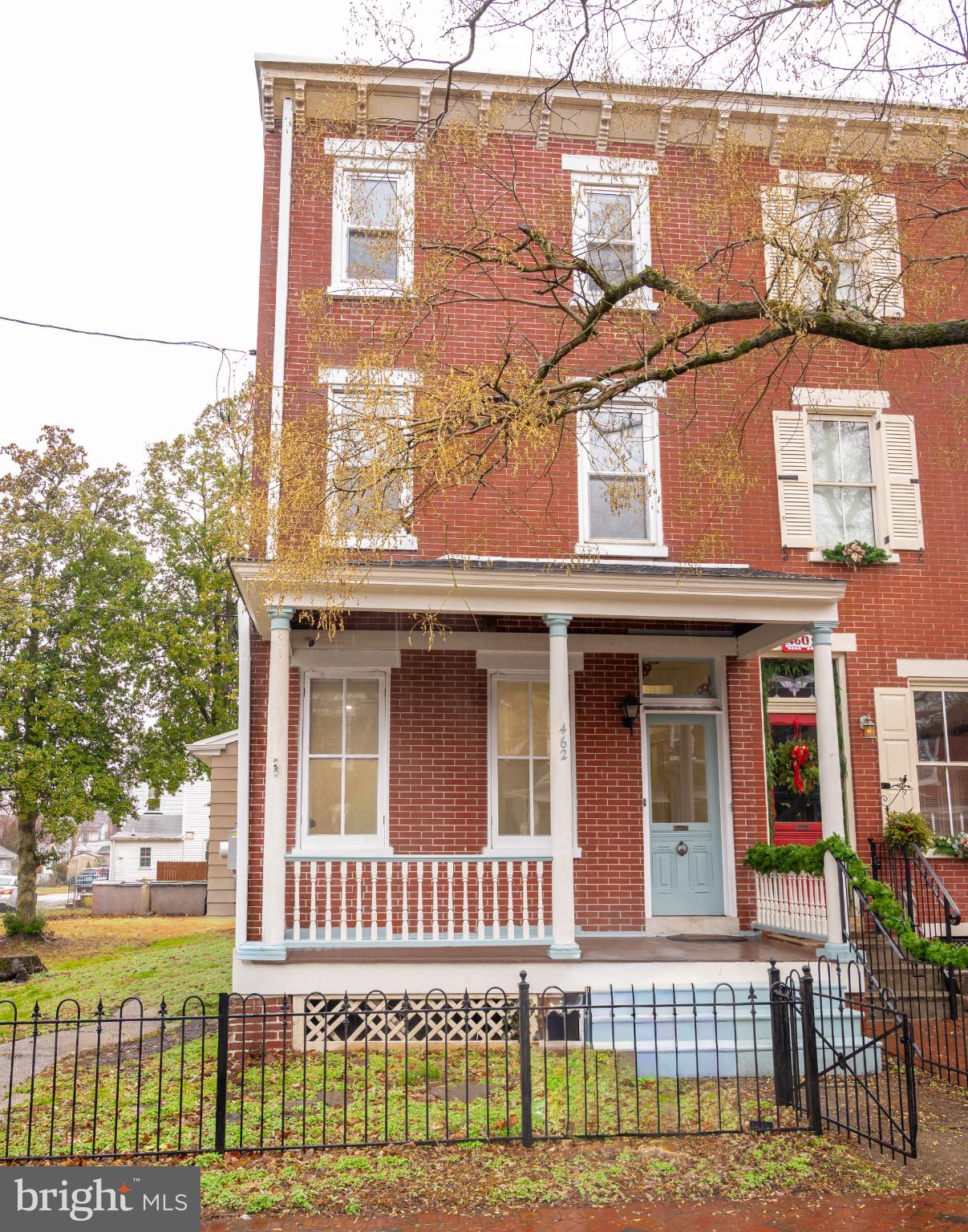 462 Locust Avenue Burlington, NJ 08016 - Photo 4 of 30 a view of a brick building next to a yard