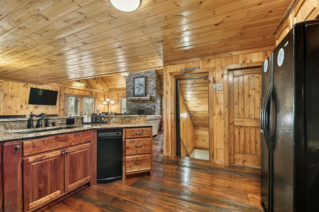 71 Rising Fawn Drive Mineral Bluff, GA 30559 - Photo 12 of 66 a kitchen with stainless steel appliances granite countertop a refrigerator and cabinets