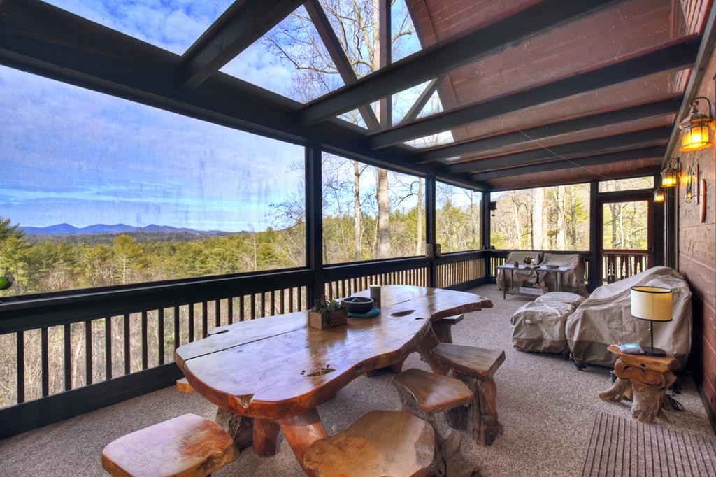 71 Rising Fawn Drive Mineral Bluff, GA 30559 - Photo 17 of 66 a view of a balcony with furniture