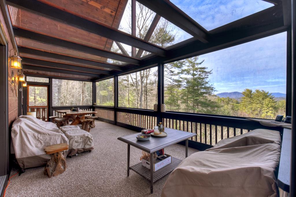 71 Rising Fawn Drive Mineral Bluff, GA 30559 - Photo 20 of 66 a bedroom with furniture and a window
