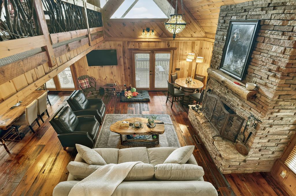 71 Rising Fawn Drive Mineral Bluff, GA 30559 - Photo 25 of 66 a living room with furniture and a flat screen tv