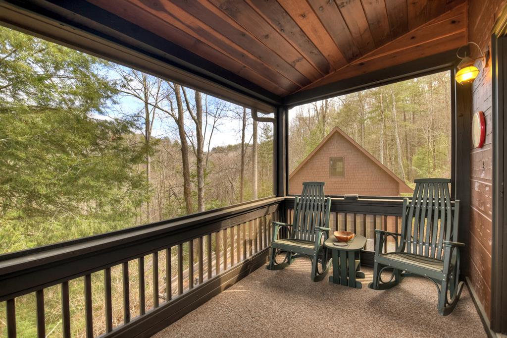 71 Rising Fawn Drive Mineral Bluff, GA 30559 - Photo 32 of 66 a view of a two chair in the balcony