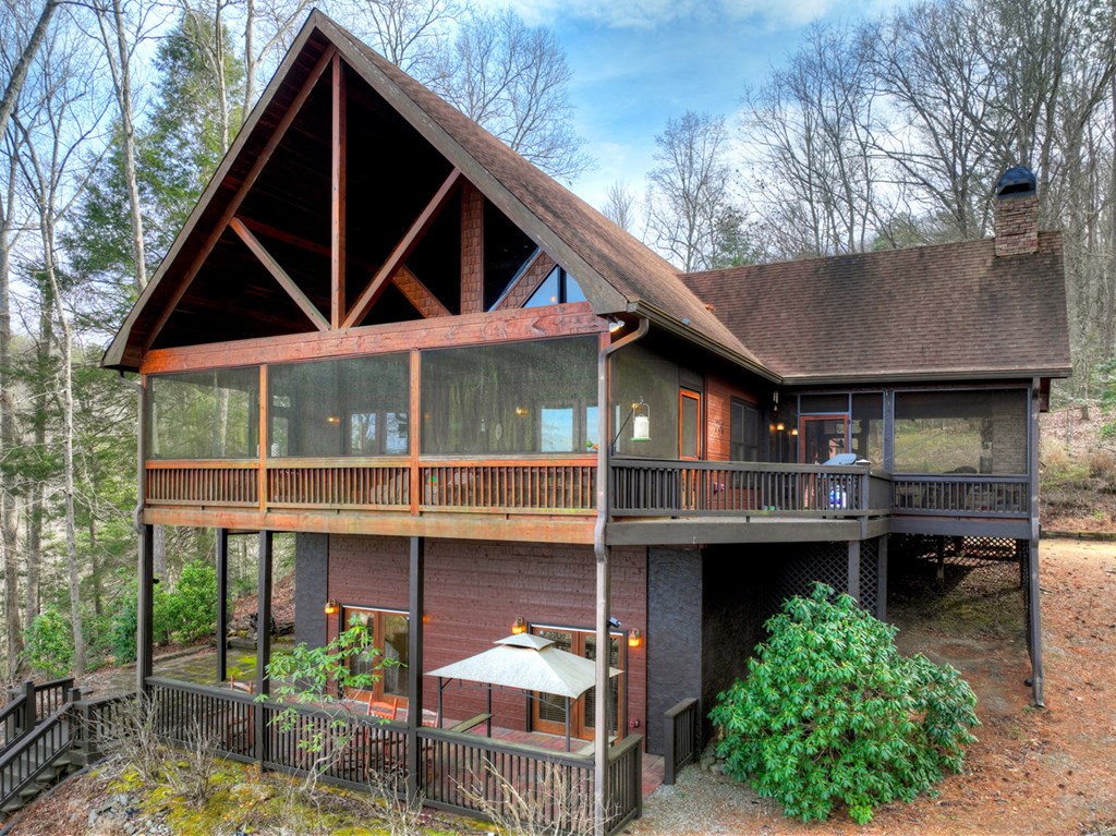 71 Rising Fawn Drive Mineral Bluff, GA 30559 - Photo 53 of 66 a front view of a house with garden