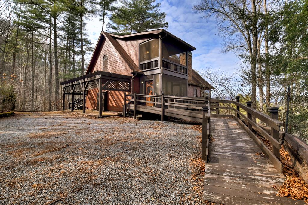 71 Rising Fawn Drive Mineral Bluff, GA 30559 - Photo 54 of 66 a view of a house with a yard