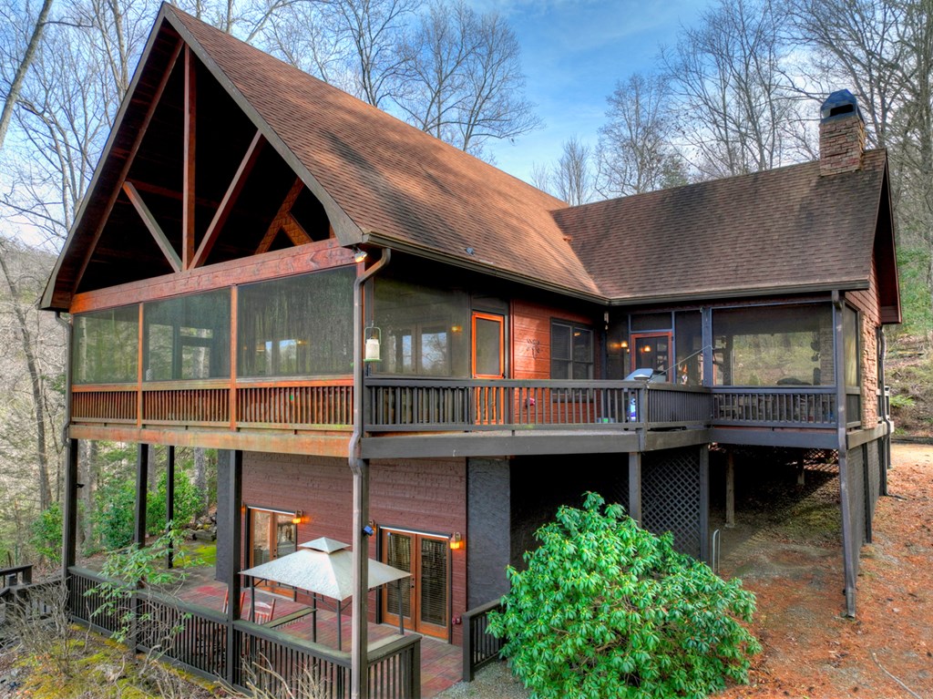 71 Rising Fawn Drive Mineral Bluff, GA 30559 - Photo 60 of 66 a front view of a house with table and chairs