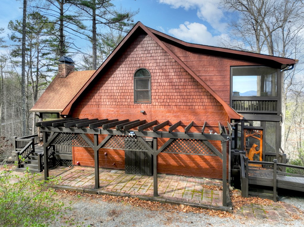 71 Rising Fawn Drive Mineral Bluff, GA 30559 - Photo 63 of 66 a view of a house with a patio