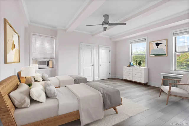 a bedroom with a bed and window