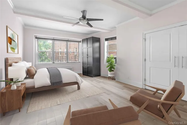 a spacious bedroom with a bed and window