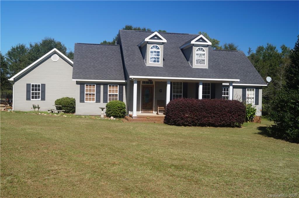 139 Bentley Town Road Union, SC 29379 - Photo 1 of 17 a front view of a house with garden
