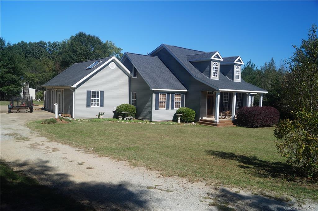 139 Bentley Town Road Union, SC 29379 - Photo 2 of 17 a front view of a house with a garden