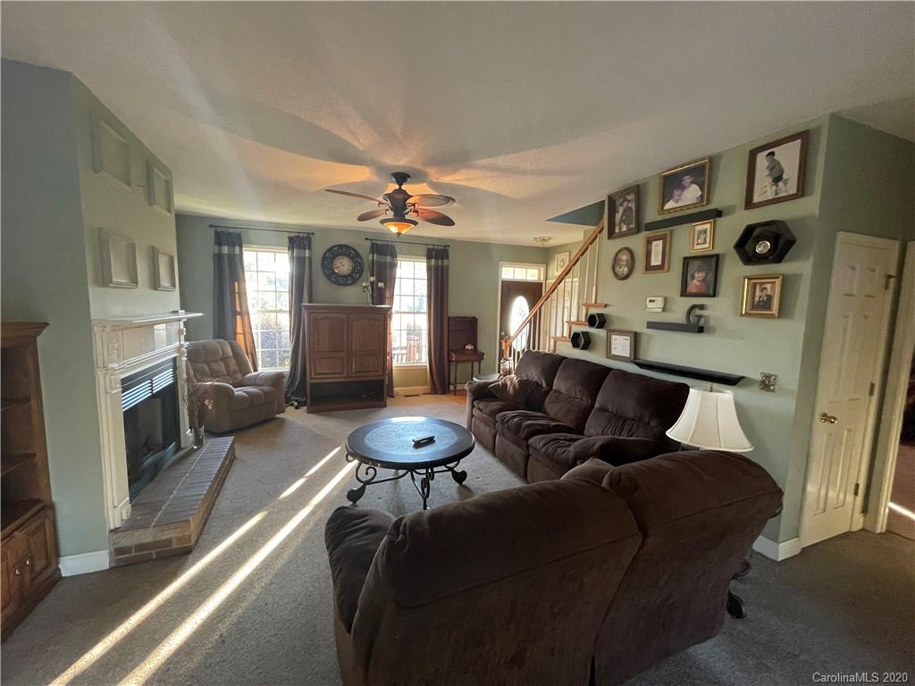 139 Bentley Town Road Union, SC 29379 - Photo 14 of 17 a living room with furniture and a fireplace