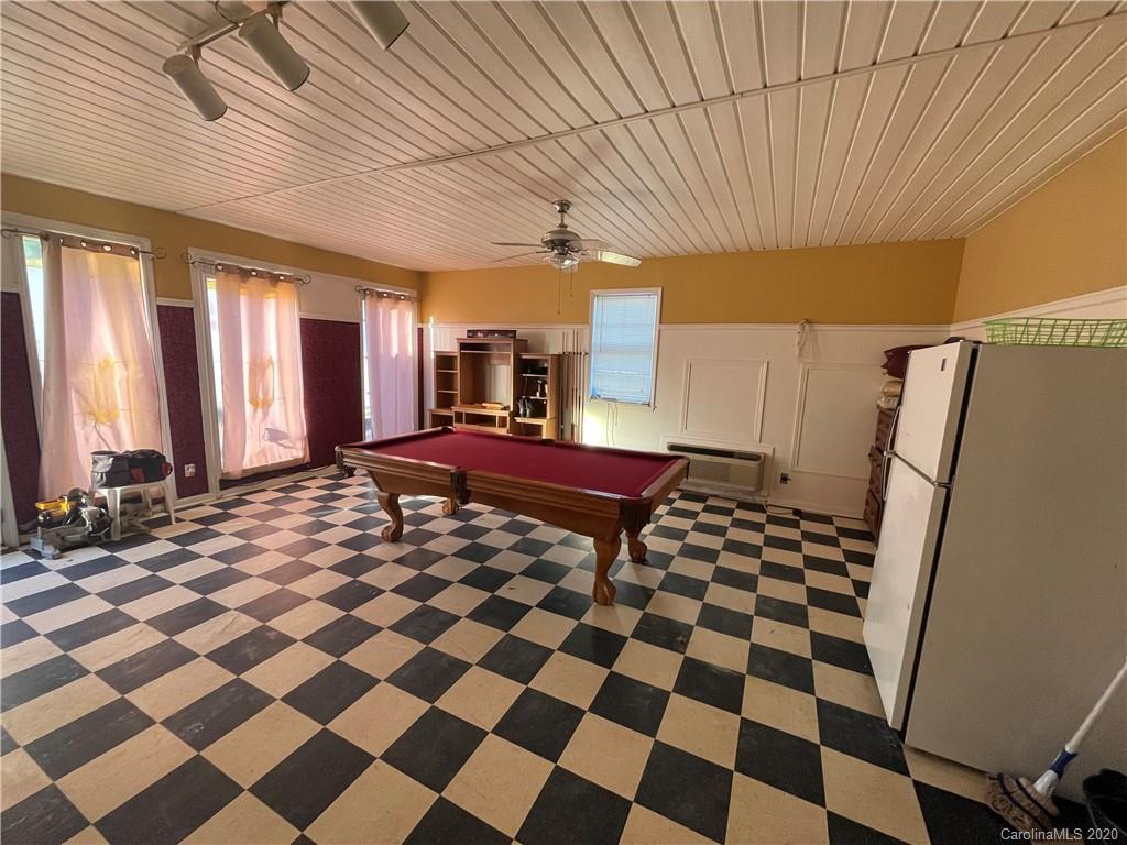 139 Bentley Town Road Union, SC 29379 - Photo 17 of 17 a view of a bedroom with a black and white checkered floor