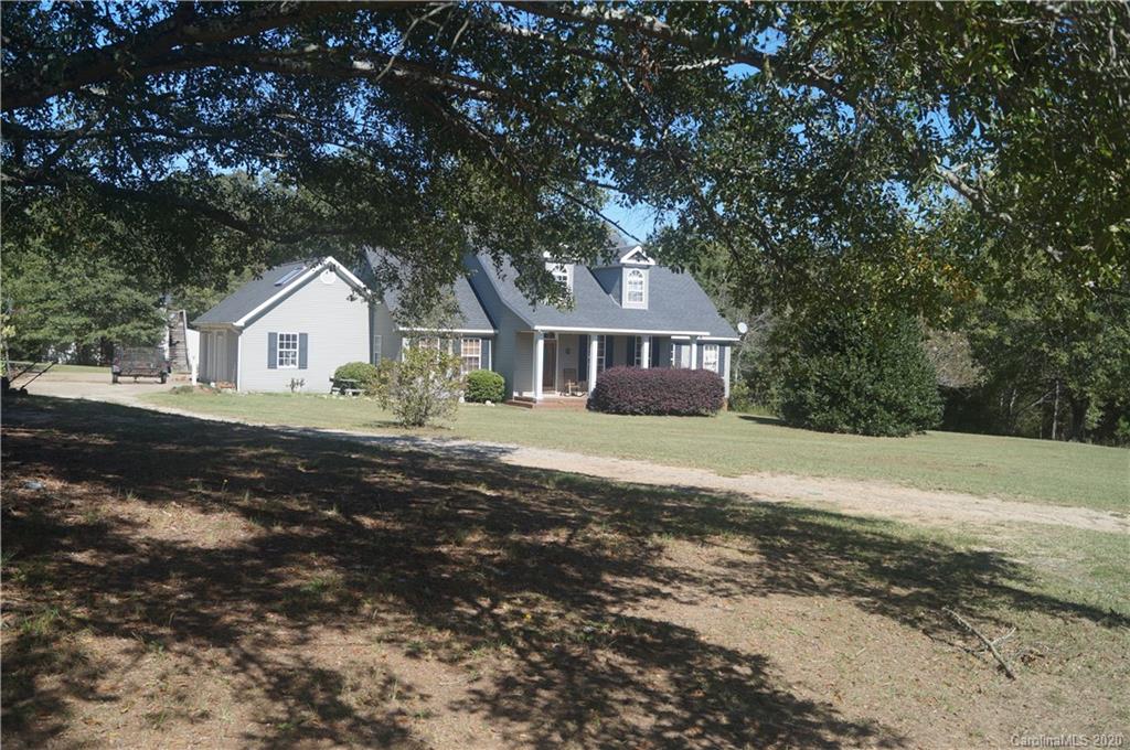 139 Bentley Town Road Union, SC 29379 - Photo 3 of 17 a front view of a house with a garden