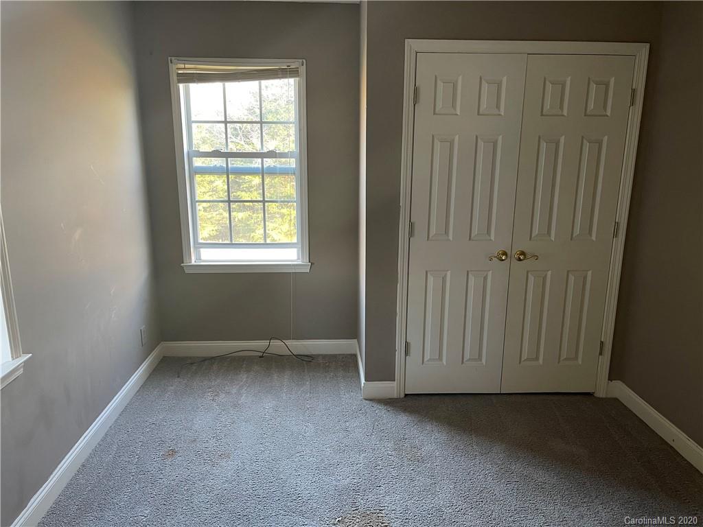 139 Bentley Town Road Union, SC 29379 - Photo 8 of 17 an empty room with a empty space and windows