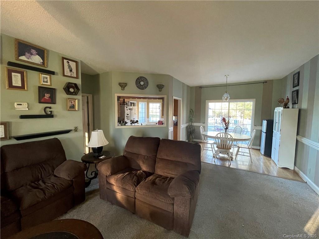 139 Bentley Town Road Union, SC 29379 - Photo 9 of 17 a living room with furniture and a window