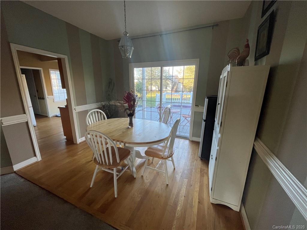 139 Bentley Town Road Union, SC 29379 - Photo 10 of 17 a view of a dining room with furniture and wooden floor