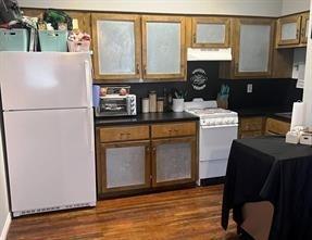 100 East Collin Street, Unit 1 Leonard, TX 75452 - Photo 1 of 4 a kitchen with a refrigerator stove and sink