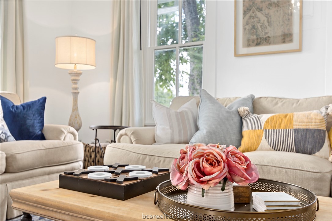 705 South Bryan Avenue Bryan, TX 77803 - Photo 12 of 47 a living room with furniture and a window