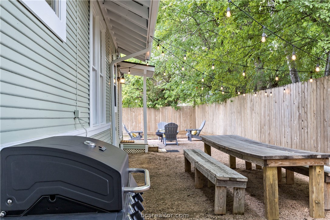 705 South Bryan Avenue Bryan, TX 77803 - Photo 41 of 47 a view of backyard with outdoor seating and trees