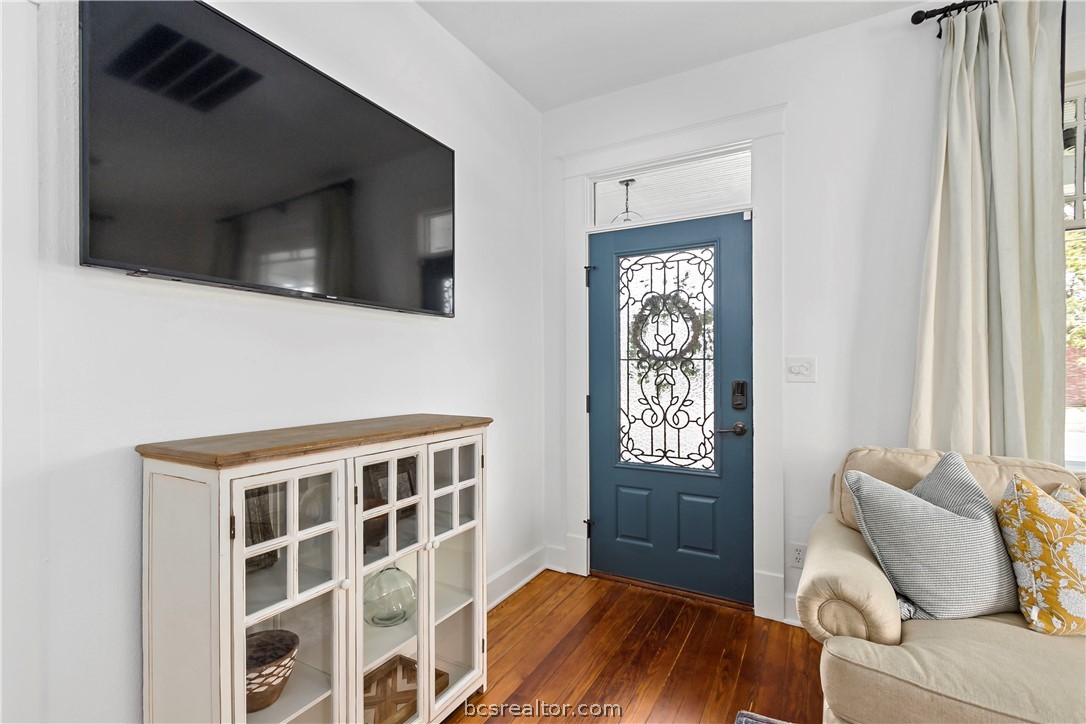 705 South Bryan Avenue Bryan, TX 77803 - Photo 7 of 47 a living room with furniture and a window
