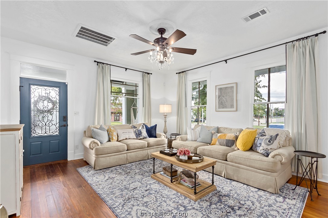 705 South Bryan Avenue Bryan, TX 77803 - Photo 8 of 47 a living room with furniture and windows