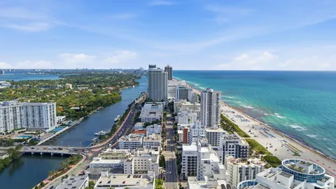 a view of city with ocean