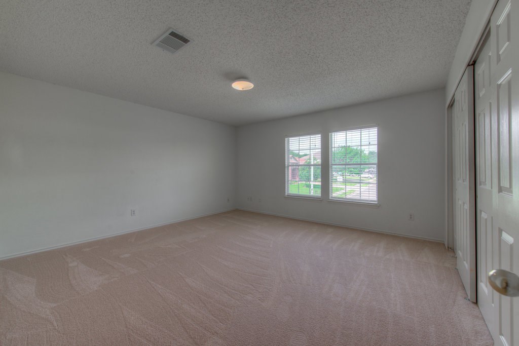 2623 Andres Way Round Rock, TX 78664 - Photo 12 of 15 an empty room with a window