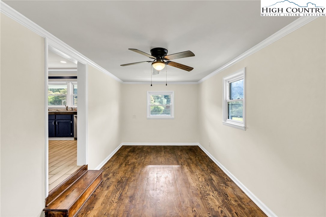 358 Dogget Road West Jefferson, NC 28694 - Photo 17 of 41 wooden floor in an empty room with a window