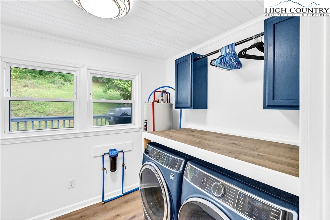 358 Dogget Road West Jefferson, NC 28694 - Photo 26 of 41 a utility room with a sink dryer and washer