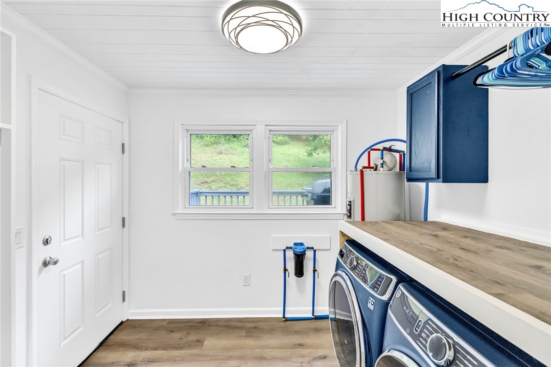 358 Dogget Road West Jefferson, NC 28694 - Photo 27 of 41 a view of kitchen island with furniture and window