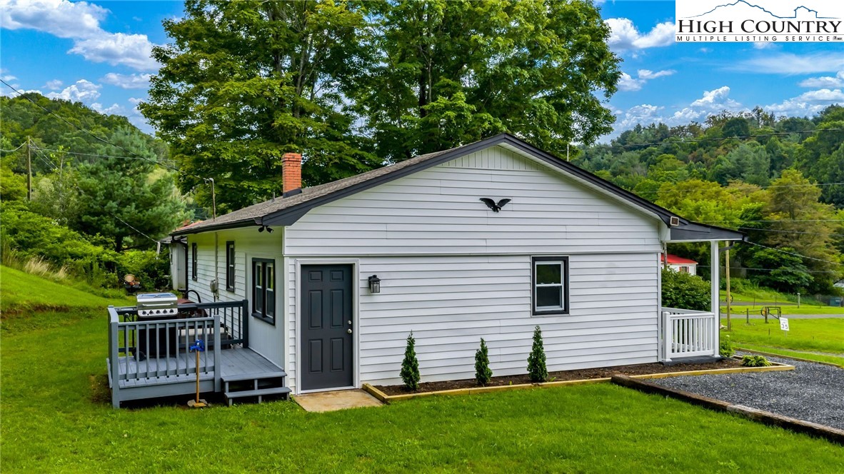 358 Dogget Road West Jefferson, NC 28694 - Photo 36 of 41 a view of a house with a yard