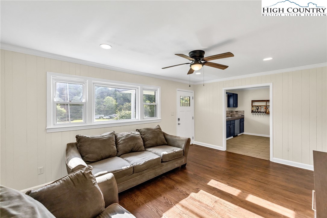 358 Dogget Road West Jefferson, NC 28694 - Photo 10 of 41 a living room with furniture and a large window