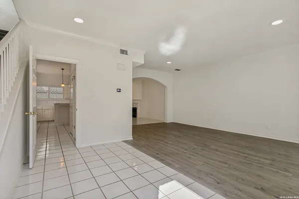 a view of an empty room and window