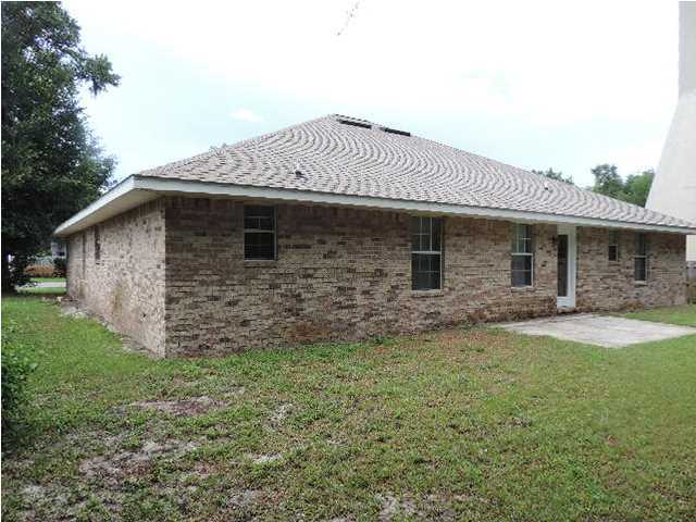 328 Beacon Way Miramar Beach, FL 32550 - Photo 22 of 22 a front view of a house with garden