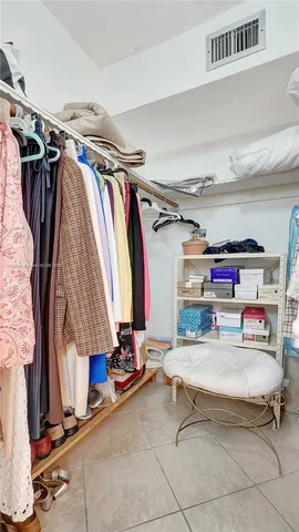 a room with a cabinets and gym equipment