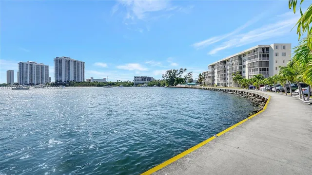 a front view of a building with garden